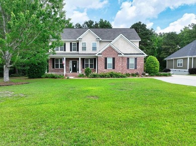 Welcome home to this beautiful custom brick 5-bedroom, 3-bath - photo 2