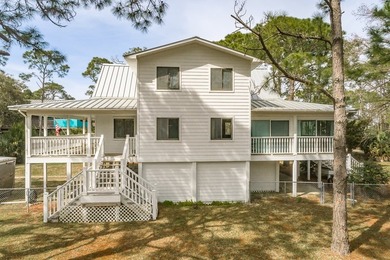 Spacious bayview home on St. George Island! Situated in the - photo 3