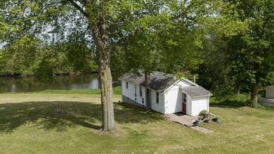 Tucked along the scenic St. Joseph River in Three Rivers, this - photo 1
