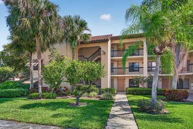Charming 2nd floor END unit filled w/ natural sunlight from an - photo 1