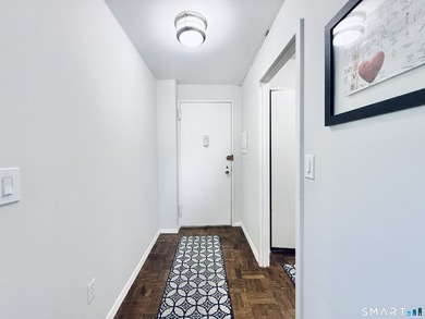 Downtown Living, Simplified & Smart: Turnkey Corner Condo at 140 - photo 16