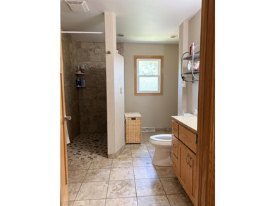 Welcome home to this conveniently updated Ranch situated on a - photo 8
