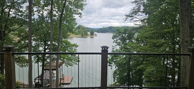 Welcoming covered front porch w/ composite decking & lake views - photo 5