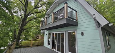Welcoming covered front porch w/ composite decking & lake views - photo 6