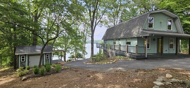 Welcoming covered front porch w/ composite decking & lake views - photo 9