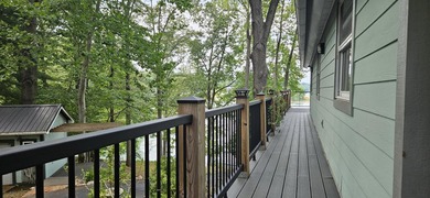 Welcoming covered front porch w/ composite decking & lake views - photo 10