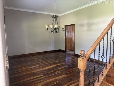 Set on 1.48 wooded acres along Lake Limestone, this custom stone - photo 6