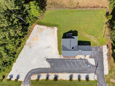 PRIME COMMERCIAL OPPORTUNITY! Sitting on 1.36 ACRES, this