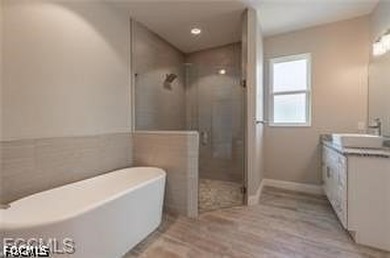SPECTACULAR CUSTOM NEW CONSTRUCTION SITUATED ON AN OVERSIZED - photo 3