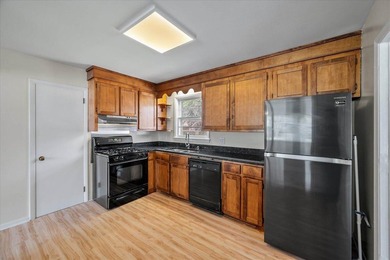 Welcome home to this well-cared-for brick beauty in the heart of - photo 12
