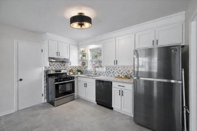 Welcome home to this well-cared-for brick beauty in the heart of - photo 13