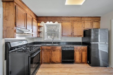 Welcome home to this well-cared-for brick beauty in the heart of - photo 15