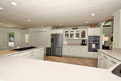 WONDERFUL HOME NESTLED IN THE WOODS ON ONE OF THE FINEST GOLF - photo 10