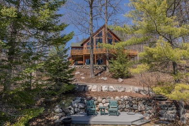 Set on 219' of shoreline along the striking blue-green waters of - photo 1