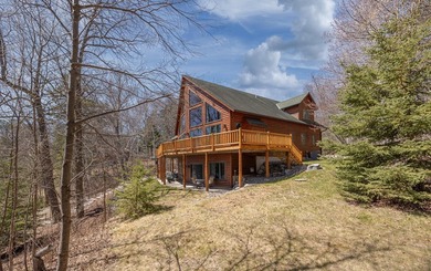 Set on 219' of shoreline along the striking blue-green waters of - photo 4