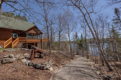 Set on 219' of shoreline along the striking blue-green waters of - photo 9
