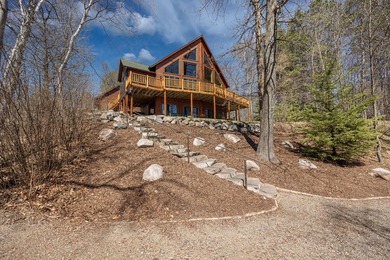 Set on 219' of shoreline along the striking blue-green waters of - photo 10