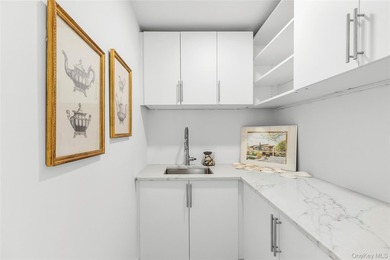 Thoughtfully renovated Southampton property set behind an - photo 9