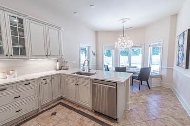 Located in the prestigious gated community of The Bluffs on the - photo 12
