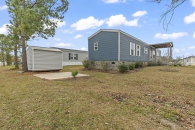 Welcome to Market Village! This welcoming 3-bedroom, 2-bath - photo 3