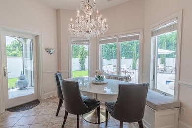 Located in the prestigious gated community of The Bluffs on the - photo 13