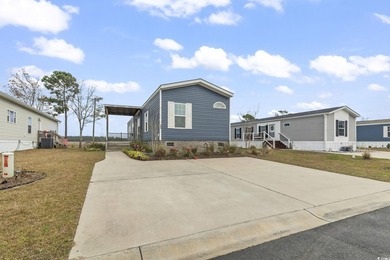 Welcome to Market Village! This welcoming 3-bedroom, 2-bath - photo 5