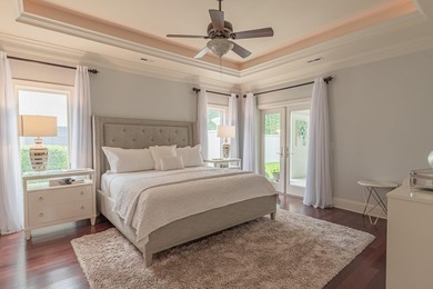 Located in the prestigious gated community of The Bluffs on the - photo 15