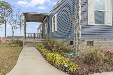Welcome to Market Village! This welcoming 3-bedroom, 2-bath - photo 7