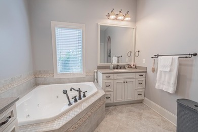 Located in the prestigious gated community of The Bluffs on the - photo 18