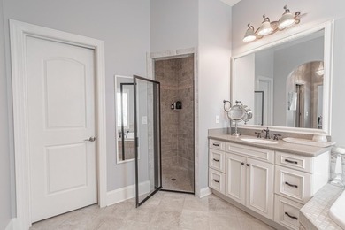 Located in the prestigious gated community of The Bluffs on the - photo 19