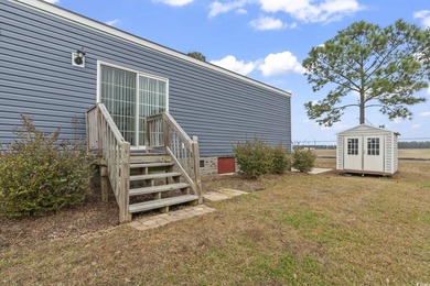 Welcome to Market Village! This welcoming 3-bedroom, 2-bath - photo 10