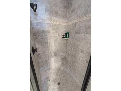 Located in the prestigious gated community of The Bluffs on the - photo 20