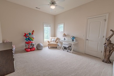 Located in the prestigious gated community of The Bluffs on the - photo 29