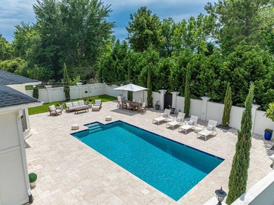 Located in the prestigious gated community of The Bluffs on the - photo 34