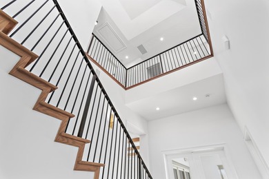 Less than a mile from the beach, this breathtaking new - photo 32