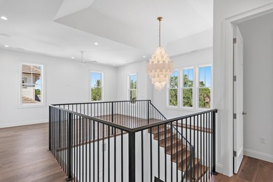 Less than a mile from the beach, this breathtaking new - photo 35