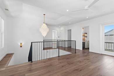 Less than a mile from the beach, this breathtaking new - photo 36