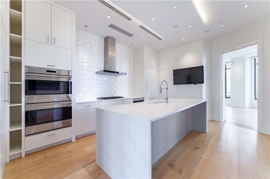 High above Buckhead in the iconic Waldorf Astoria, this