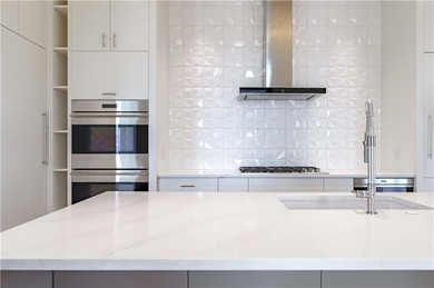 High above Buckhead in the iconic Waldorf Astoria, this