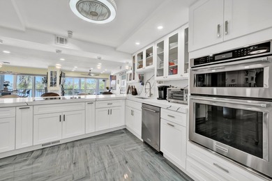 One of the finest three-bedroom waterfront residences in - photo 11