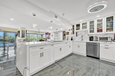 One of the finest three-bedroom waterfront residences in - photo 12