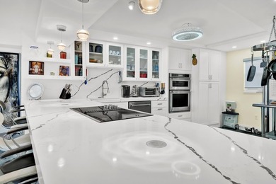 One of the finest three-bedroom waterfront residences in - photo 13