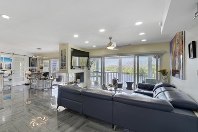 One of the finest three-bedroom waterfront residences in - photo 15