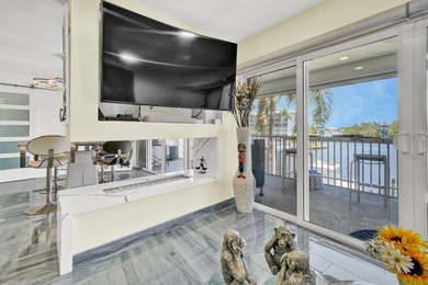 One of the finest three-bedroom waterfront residences in - photo 16