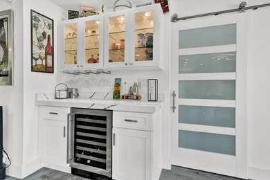 One of the finest three-bedroom waterfront residences in - photo 17