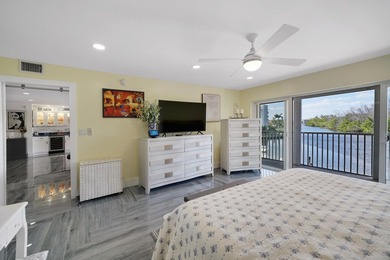 One of the finest three-bedroom waterfront residences in - photo 19