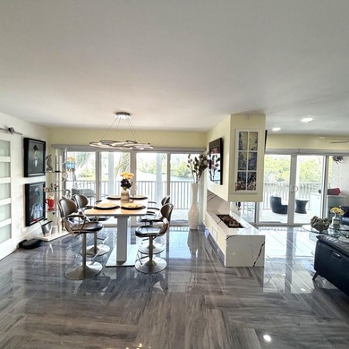 One of the finest three-bedroom waterfront residences in - photo 20