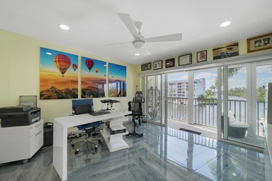 One of the finest three-bedroom waterfront residences in - photo 22