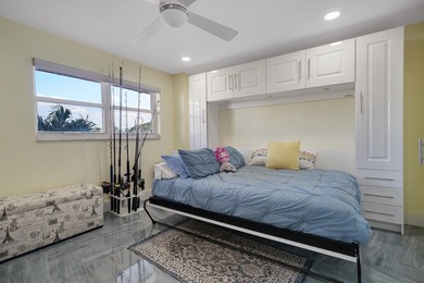 One of the finest three-bedroom waterfront residences in - photo 26