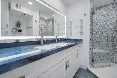 One of the finest three-bedroom waterfront residences in - photo 27